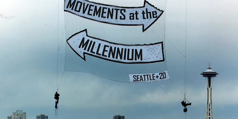 Panel: Social Movements from the 1990s - 2020s, March 11, 2021 Photo of a Rainforest Action Network banner drop over Seattle, November 1999